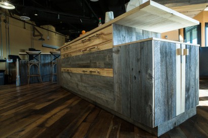 reclaimed salvaged repurposed antique barn board and heart pine flatsawn cabinets and skip-planed oak flooring at the venture cafe in cambridge innovation center in kendall square massachusetts