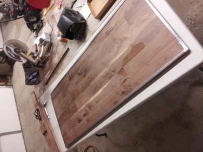 reclaimed repurposed antique salvaged walnut flooring used for a bedroom headboard by longleaf lumber