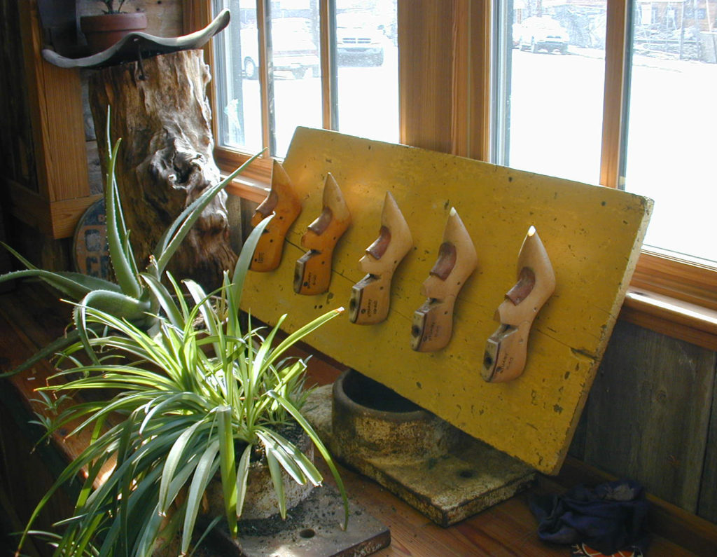 A coat rack made from antique shoe lasts salvaged from a mill in Lawrence, Massachusetts. A coat rack made from antique shoe lasts salvaged from a mill in Lawrence, Massachusetts.