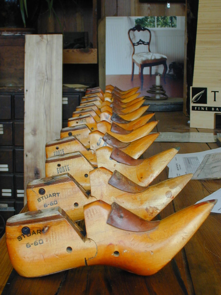 A coat rack made from antique shoe lasts salvaged from a mill in Lawrence, Massachusetts. A coat rack made from antique shoe lasts salvaged from a mill in Lawrence, Massachusetts.