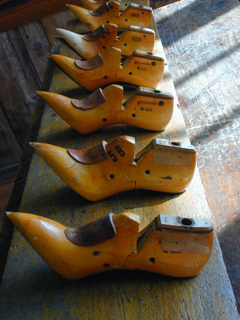 A coat rack made from antique shoe lasts salvaged from a mill in Lawrence, Massachusetts. A coat rack made from antique shoe lasts salvaged from a mill in Lawrence, Massachusetts.