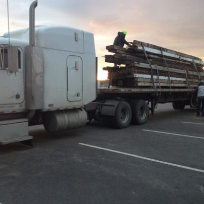 Loading Antique Heart Pine Beams at The Fore River Shipyard in Quincy, MA