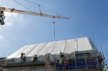 Reclaimed Heart Pine Beam Installation at GSA Mackintosh Building