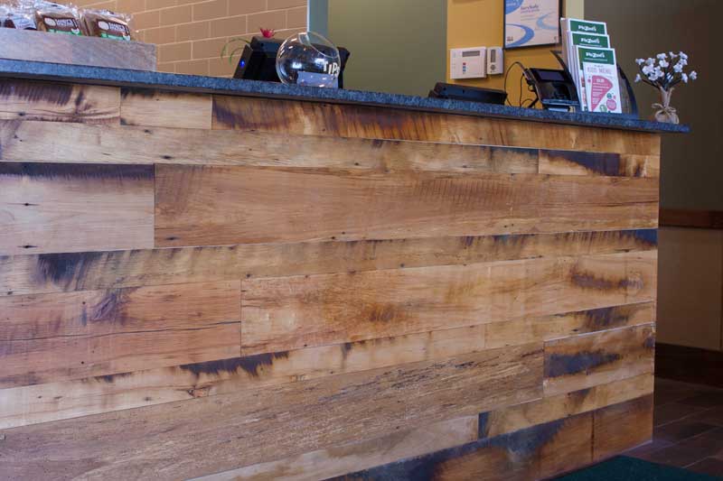 Restaurant Reclaimed Skip-Planed Mixed Hardwoods Paneling in Attleboro, MA. Finished with Water-Based Polyurethane. Restaurant Reclaimed Skip-Planed Mixed Hardwoods Paneling in Attleboro, MA. Finished with Water-Based Polyurethane.