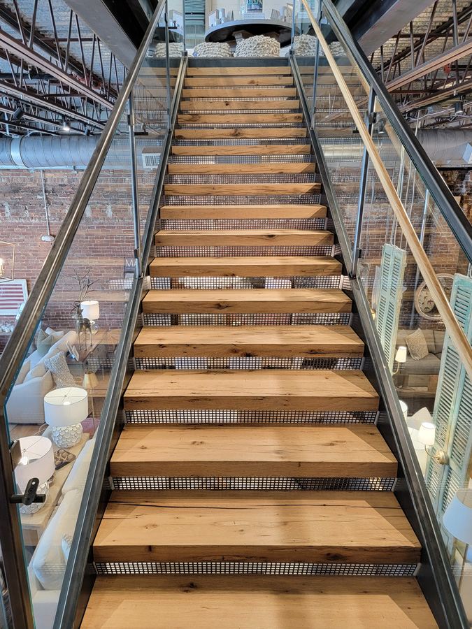 Reclaimed white oak stair treads in retail store Reclaimed white oak stair treads in retail store