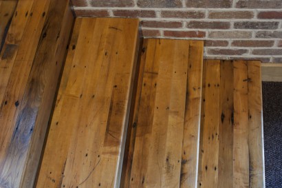 Reclaimed maple stairs at An Unlikely Story bookstore